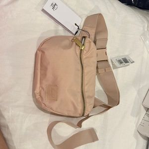 Blush color Herschel Fanny pack